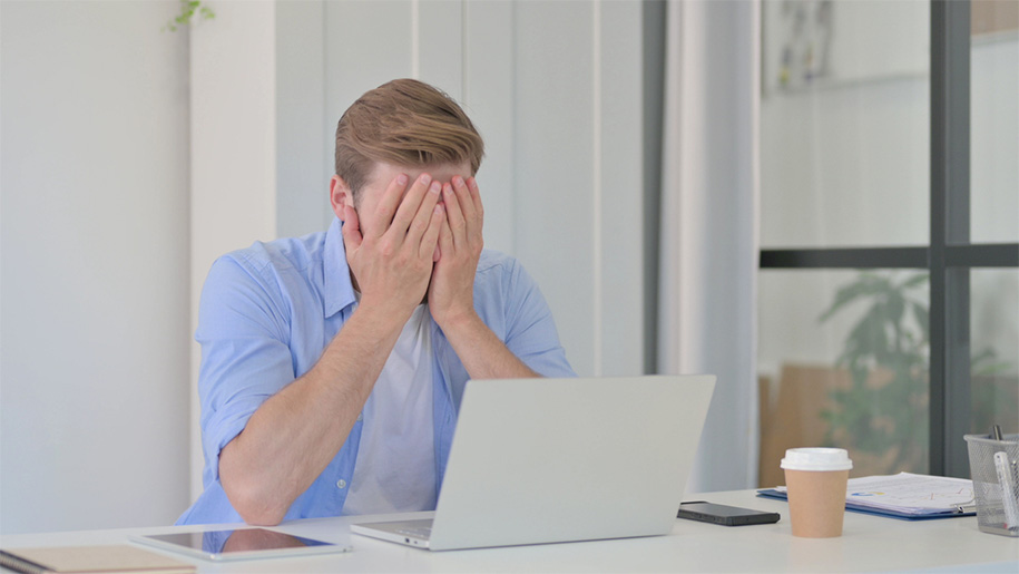 Business owner struggling with website domain registration and digital marketing Wilmington NC